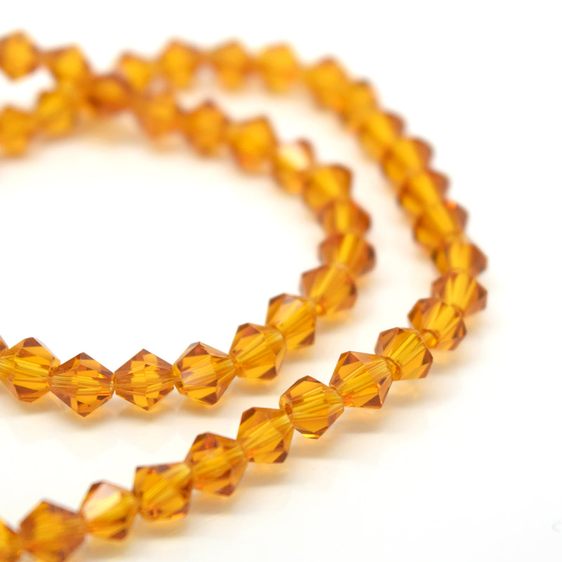STAR BEADS: FACETED BICONE GLASS BEADS - TOPAZ - Bicone Beads