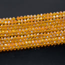 Faceted Rondelle Glass Beads - Light Orange Lustre/AB