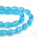 STAR BEADS: FACETED TEARDROP GLASS BEADS  - AQUAMARINE - Teardrop Beads