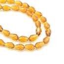Faceted Teardrop Glass Beads  - Topaz