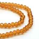 STAR BEADS: 98-100 x Faceted Rondelle Glass Beads Dark Topaz 4mm - Rondelle Beads